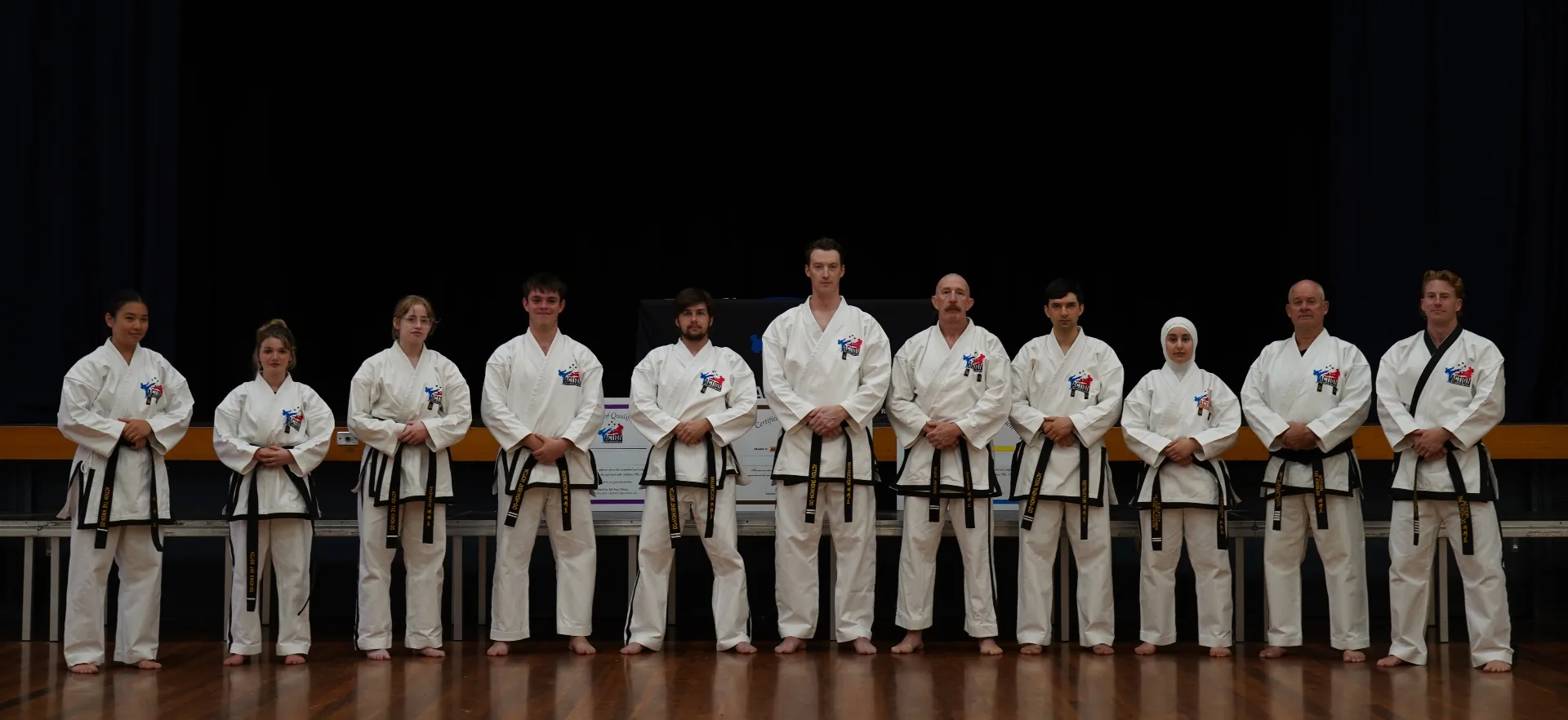 Action Tae Kwon-Do instructors group photo, Mitchell HQ, March 2026