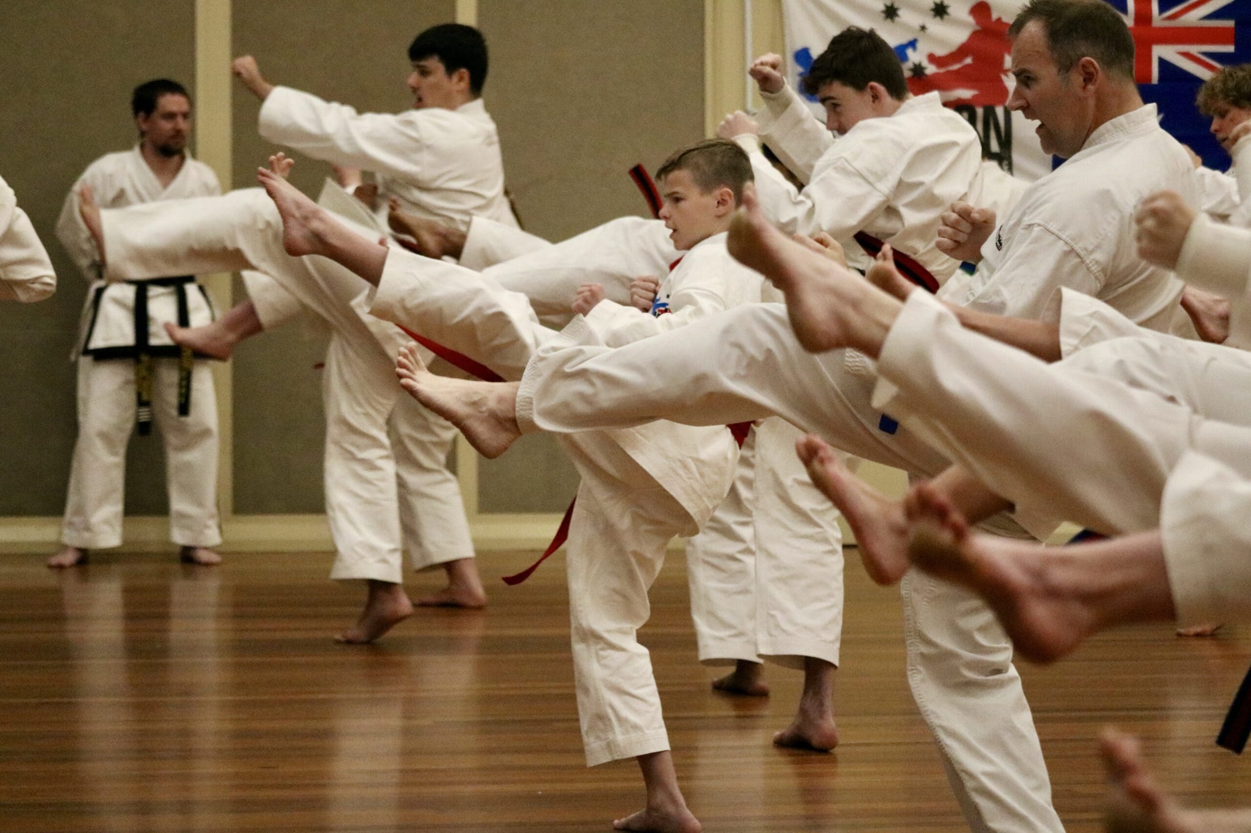 Action Tae Kwon-Do adult students inn action at a grading.